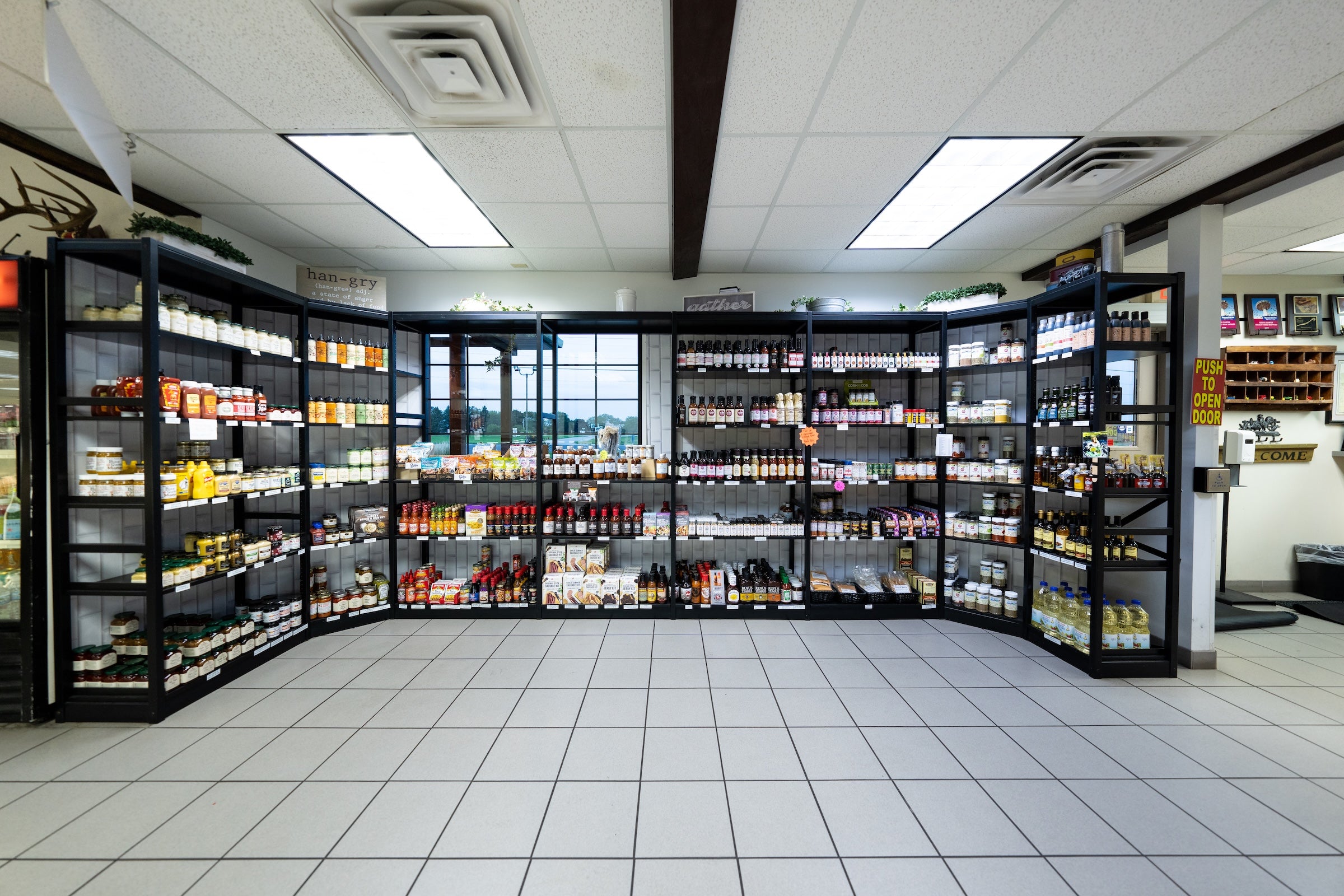 store shelves full of seasonings at lake geneva country meats