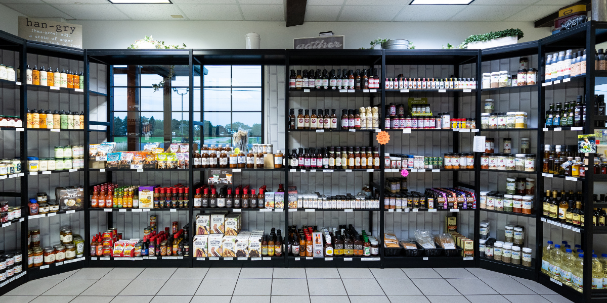 Store shelves with various seasonings and sauces