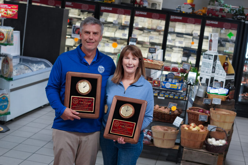 scott and kathy vorpagel holding awards