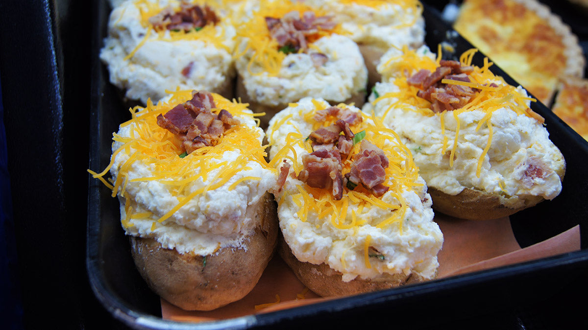 twice baked potatos in deli tray