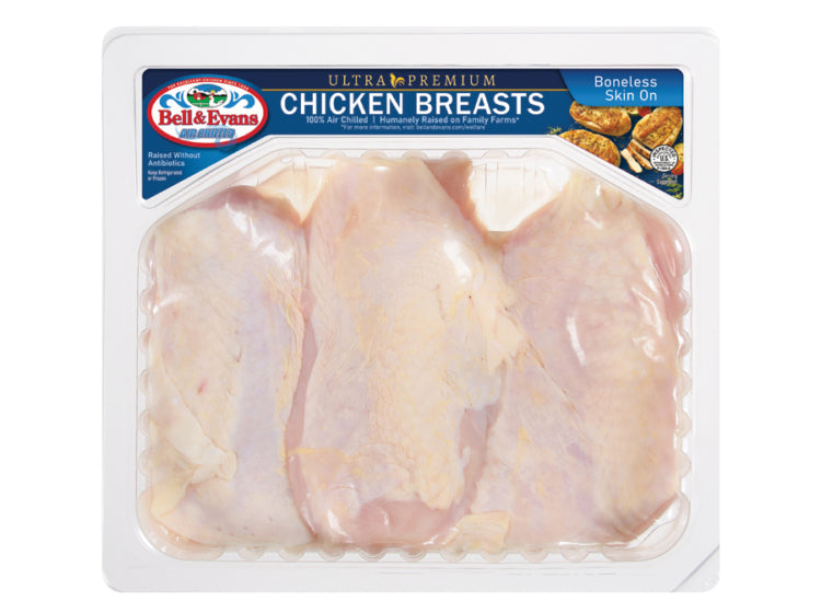 Packaged chicken breasts with Bell & Evans logo on a white background
