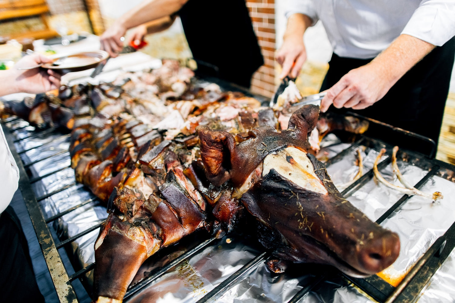 carving a whole roast pig
