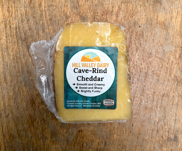a wedge of cheese on a table