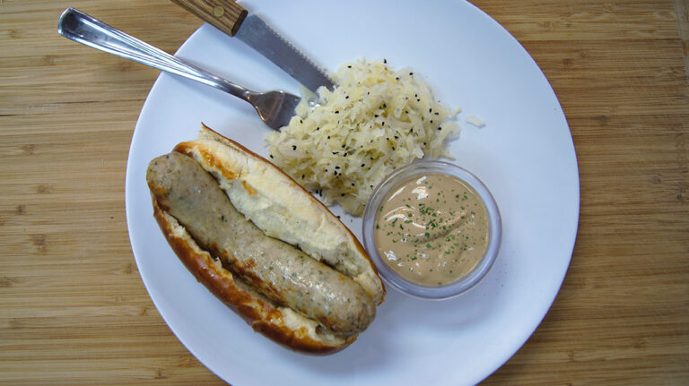 Plated bockwurst sausage