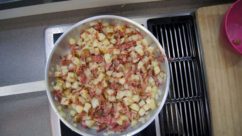 Corned Beef Hash Frying with Corned Beef